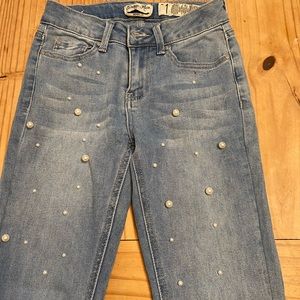 Ankle jeans with pearl details